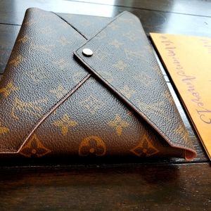 Guaranteed Authentic Louis Vuitton Large Kiragami Pouch
